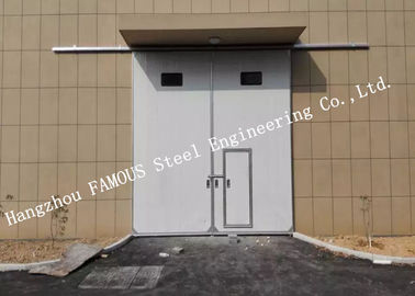 China Portas industriais deslizantes horizontais secionais da garagem com a porta pedestre do acesso para a oficina fornecedor