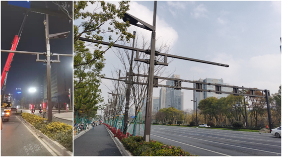 China Anunciou a rua de aço polo claro das colunas da iluminação com os braços para a montagem da câmera fornecedor