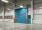 Portas industriais isoladas da garagem da porta do rolamento da fábrica que levantam para o uso interno e externo do armazém fornecedor